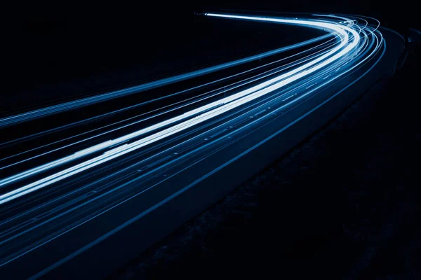 Stock image blue car lights at night. long exposure.