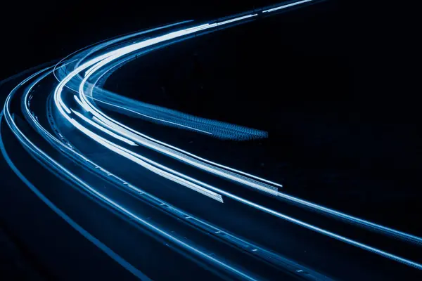 stock image blue car lights at night. long exposure.