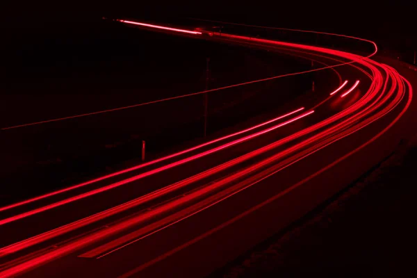 stock image lights of cars driving at night. long exposure