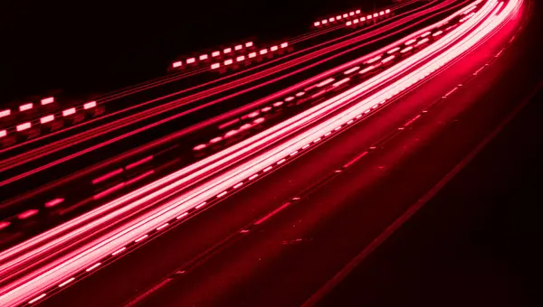 stock image lights of cars driving at night. long exposure