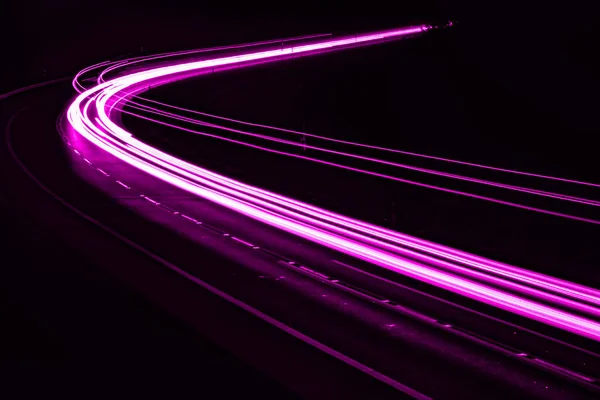 stock image violet car lights at night. long exposure