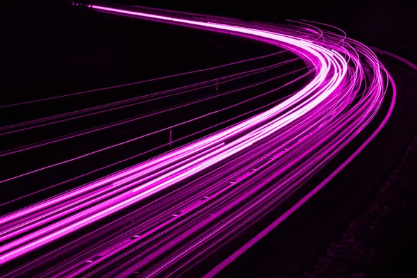 stock image violet car lights at night. long exposure