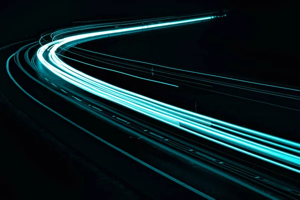 stock image blue car lights at night. long exposure