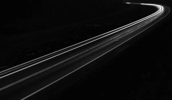 Białe Linie Świateł Samochodowych Czarnym Tle — Zdjęcie stockowe