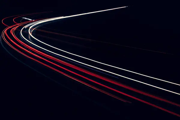 stock image lights of cars driving at night. long exposure