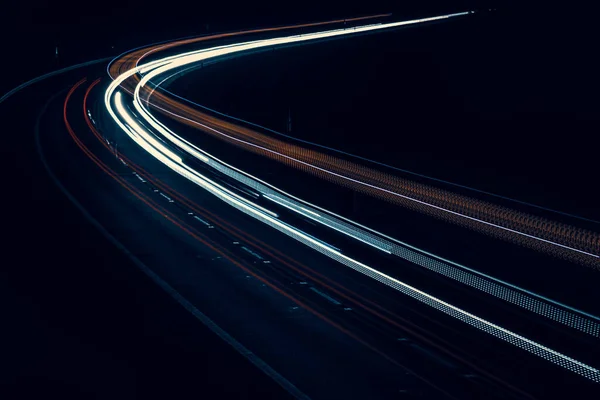 stock image lights of cars driving at night. long exposure