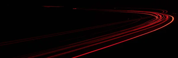 红色的车灯在晚上 长期接触 — 图库照片