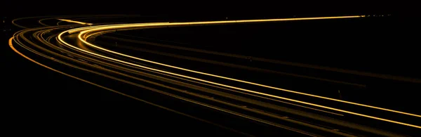 Geceleyin Turuncu Araba Işıkları Uzun Pozlama — Stok fotoğraf