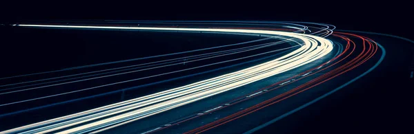 stock image lights of cars driving at night. long exposure