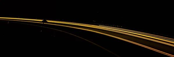 Geceleyin Turuncu Araba Işıkları Uzun Pozlama — Stok fotoğraf