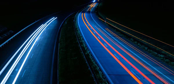 stock image lights of cars driving at night. long exposure