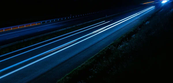 stock image lights of cars driving at night. long exposure