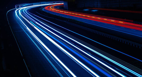 Lights of cars driving at night. long exposure