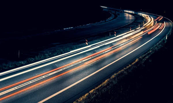 stock image lights of cars driving at night. long exposure