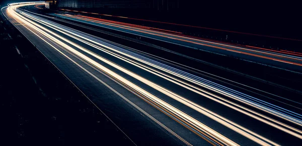 Stock image lights of cars driving at night. long exposure