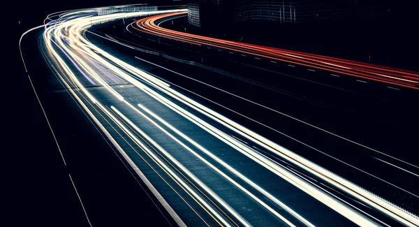 stock image lights of cars driving at night. long exposure