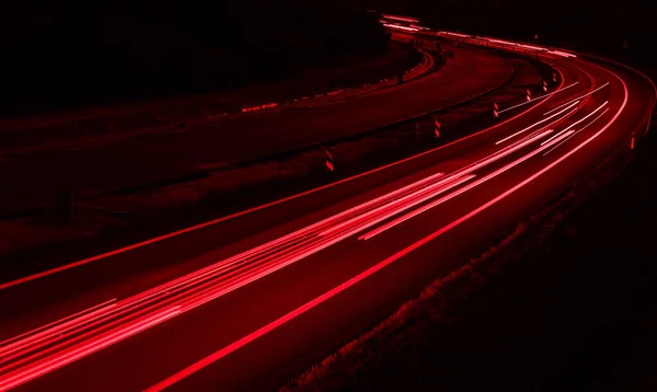 stock image lights of cars driving at night. long exposure