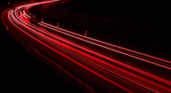 stock image lights of cars driving at night. long exposure