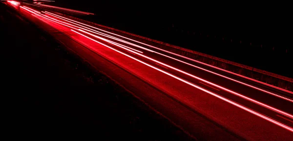 stock image lights of cars driving at night. long exposure