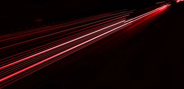 stock image lights of cars driving at night. long exposure