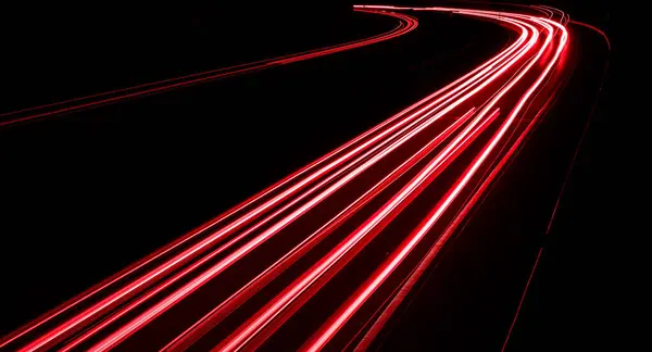 stock image lights of cars driving at night. long exposure