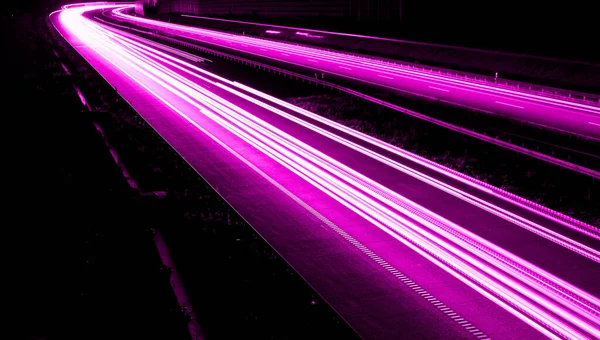 stock image violet car lights at night. long exposure