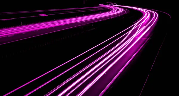 stock image violet car lights at night. long exposure