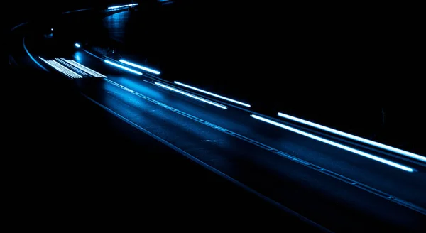 stock image blue car lights at night. long exposure