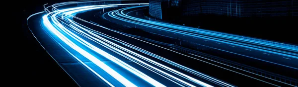 stock image blue car lights at night. long exposure