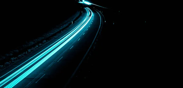 stock image blue car lights at night. long exposure