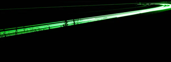 Luces Verdes Del Coche Por Noche Larga Exposición —  Fotos de Stock
