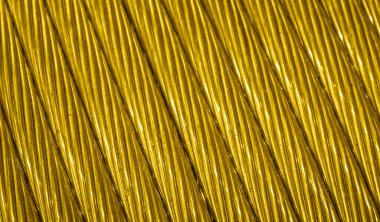 Görünür detaylara sahip altın bakır kablolar. arkaplan veya doku