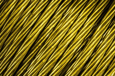 Altın alüminyum elektrik kablosu. Arka plan veya doku
