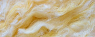 Görünür desenli sarı mineral yünü.