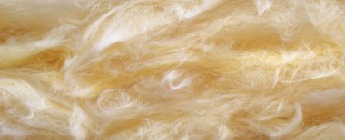 Görünür desenli sarı mineral yünü.
