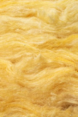 Görünür desenli sarı mineral yünü.