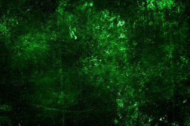 Beyaz, eski, soyulmuş boyayla boyanmış yeşil duvar.