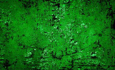 Beyaz, eski, soyulmuş boyayla boyanmış yeşil duvar.