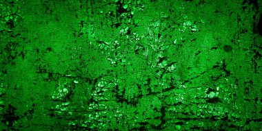 Beyaz, eski, soyulmuş boyayla boyanmış yeşil duvar.