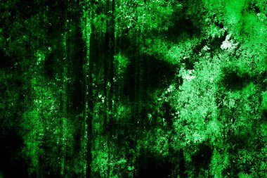 Beyaz, eski, soyulmuş boyayla boyanmış yeşil duvar.