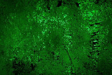 Beyaz, eski, soyulmuş boyayla boyanmış yeşil duvar.