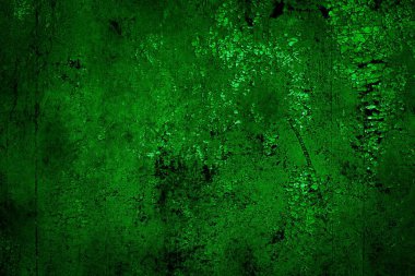 Beyaz, eski, soyulmuş boyayla boyanmış yeşil duvar.