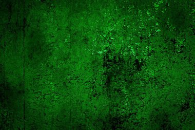 Beyaz, eski, soyulmuş boyayla boyanmış yeşil duvar.