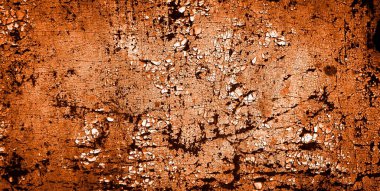 turuncu duvar beyaz eski soyulmuş boyayla boyanmış.