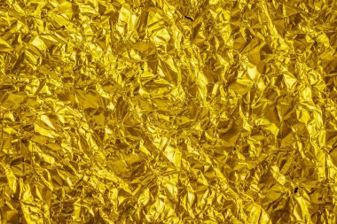 Buruşmuş altın levha metal. arkaplan veya doku