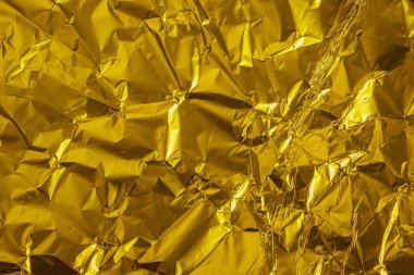 Buruşmuş altın levha metal. arkaplan veya doku