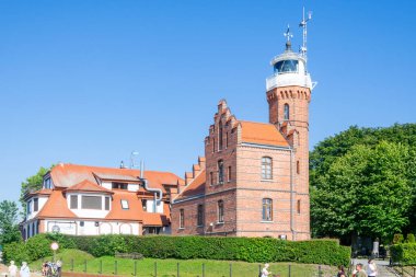 Ustka, Polska - 24.06.2024 - zabytkowa latarnia morska w Ustce