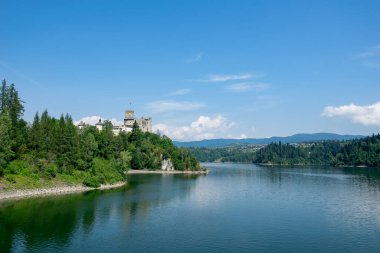 Czorsztyn reservoir in Niedzica in the Polish mountains clipart