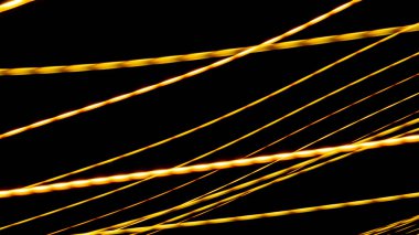 Siyah arkaplanda sarı ışık çizgileri