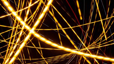 Siyah arkaplanda sarı ışık çizgileri